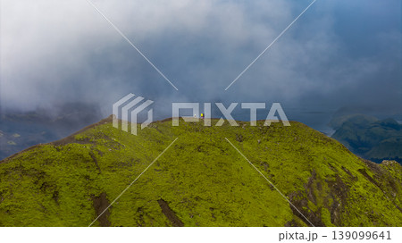 Aerial View of Moss Covered Hill with Figures in Iceland 139099641