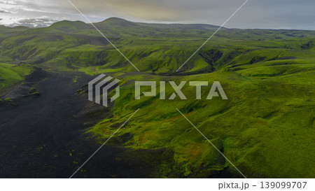 Aerial View of Iceland's Moss Covered Hills and Volcanic Soil 139099707