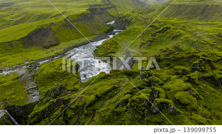 Aerial View of Moss Covered Canyon with River and Waterfall in Iceland Aerial View of Moss Covered Canyon with River and Waterfall in Iceland 139099755