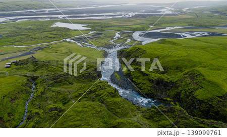 Aerial View of Icelandic Gorge, River, and Black Sand Plain Aerial View of Icelandic Gorge, River, and Black Sand Plain 139099761