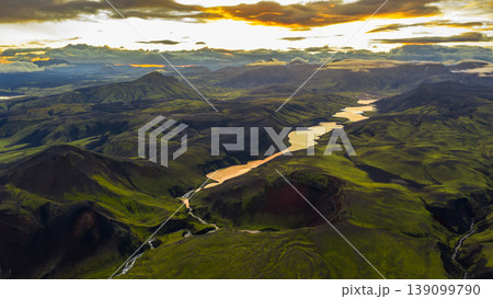 Aerial View of Iceland's Volcanic Landscape with River at Sunset 139099790