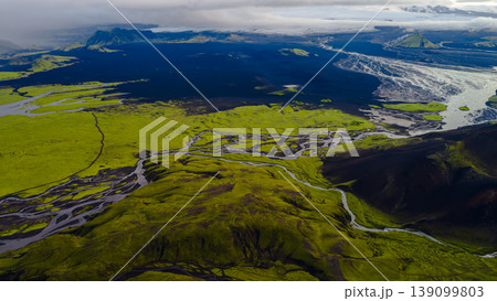 Aerial View of Moss Covered Hills, Volcanic Plains, and Glacier in Iceland Aerial View of Moss Covered Hills, Volcanic Plains, and Glacier in Iceland 139099803