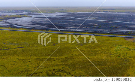 Aerial View of Icelandic Moss Plain, Riverbed, and Straight Road Aerial View of Icelandic Moss Plain, Riverbed, and Straight Road 139099836