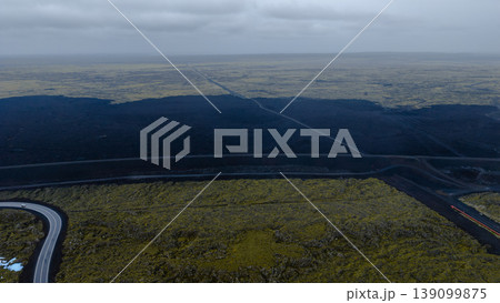Aerial View of Iceland's Volcanic Landscape with Winding Road Aerial View of Iceland's Volcanic Landscape with Winding Road 139099875