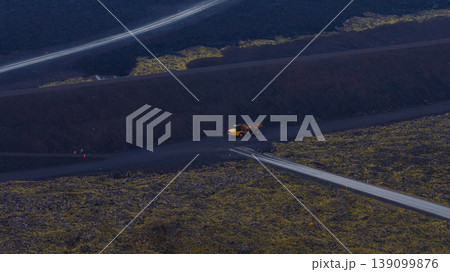 Aerial View of Volcanic Landscape with Roads and Construction Vehicle Aerial View of Volcanic Landscape with Roads and Construction Vehicle 139099876