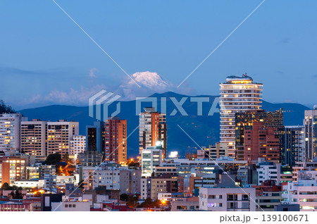 Quito skyline at sunset with the Cayambe volcano in the background. Quito skyline at sunset with the Cayambe volcano in the background. 139100671