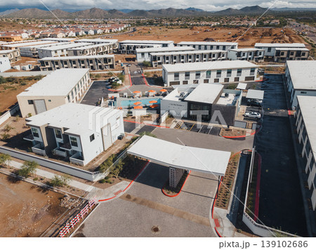 Facility Overview Summary. Ground And Aerial Facility Visuals. Summary Of Operational Zones From Ground And Sky. Comprehensive Depiction Of Service Areas And Nearby Buildings From Above 139102686