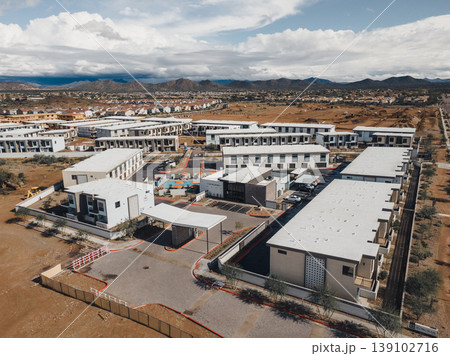 Manufacturing Complex Integrated With Renewable Power Systems. Overview Of Manufacturing And Warehouse Site Incorporating Solar Power Installations And Transportation Infrastructure Manufacturing Complex Integrated With Renewable Power Systems. Overview Of Manufacturing And Warehouse Site Incorporating Solar Power Installations And Transportation Infrastructure 139102716
