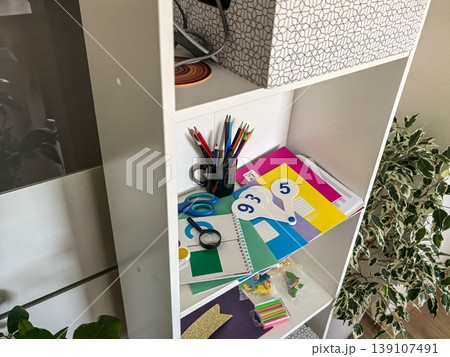 Shelving Unit with Educational Tools and Crafts 139107491