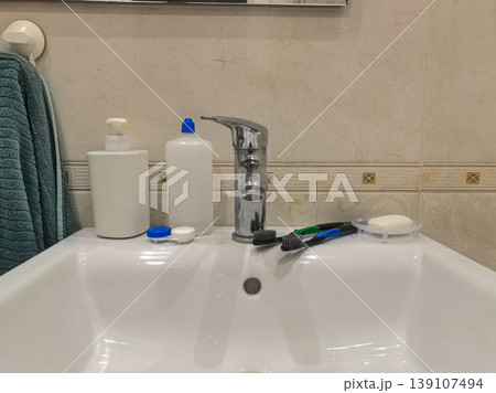 Daily Toiletries on Bathroom Sink Counter Daily Toiletries on Bathroom Sink Counter 139107494