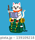 Adventurous Cat Reading a Map on a Backpack 139109218