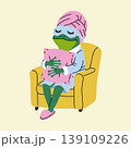 Relaxed Frog Enjoying Cozy Time in a Robe with a Pillow 139109226