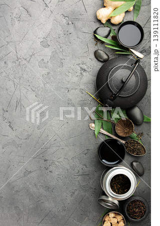 Asian Tea Ceremony Elements with Copy Space on Dark Stone Asian Tea Ceremony Elements with Copy Space on Dark Stone 139111820
