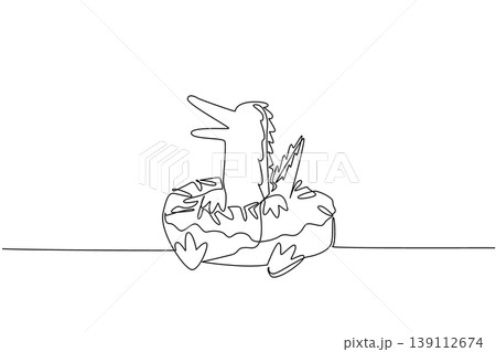 Continuous line drawing of playful crocodile shows cute animal lying inside donut with sprinkle for dessert concept. Unique design features swamp reptile for an international food day in minimalist Continuous line drawing of playful crocodile shows cute animal lying inside donut with sprinkle for dessert concept. Unique design features swamp reptile for an international food day in minimalist 139112674