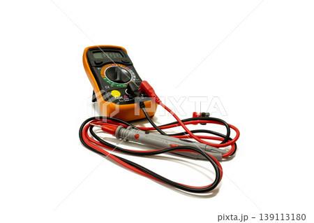 Professional digital multimeter featuring red and black test leads. Ideal for measuring voltage and resistance in electrical repairs, isolated on white. Professional digital multimeter featuring red and black test leads. Ideal for measuring voltage and resistance in electrical repairs, isolated on white. 139113180