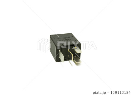 Close up of a black 4 pin universal automotive relay with circuit diagram, essential for vehicle electrical systems and DIY electronics. Close up of a black 4 pin universal automotive relay with circuit diagram, essential for vehicle electrical systems and DIY electronics. 139113184