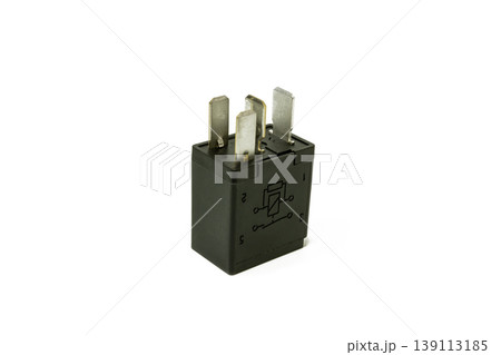 Close up of a black 4 pin universal automotive relay with circuit diagram, essential for vehicle electrical systems and DIY electronics. 139113185