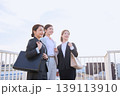 朝の通勤風景・歩道橋を歩く笑顔の若手女性ビジネスパーソン3人組・就職活動・新入社員イメージ 139113910