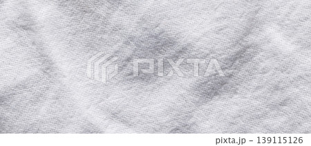 Crumpled white cotton fabric texture with soft folds for a natural linen background 139115126