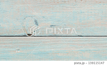 Rustic light blue wooden plank background with distressed paint texture and weathered surface Rustic light blue wooden plank background with distressed paint texture and weathered surface 139115147