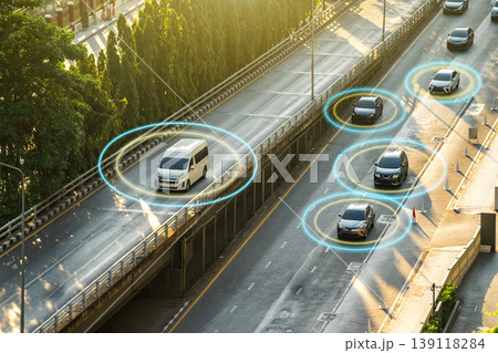 Satellite car navigation. Cars are driving along road. Large road junction. Lines connect moving cars. Concept satellite navigation tech. Tracking vehicles from satellite. Use navigation technologies Satellite car navigation. Cars are driving along road. Large road junction. Lines connect moving cars. Concept satellite navigation tech. Tracking vehicles from satellite. Use navigation technologies 139118284