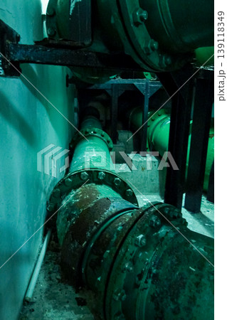 Close-up of the pipe in the buildings. Rusted pipe in the building. Building feature, industry concept. 139118349
