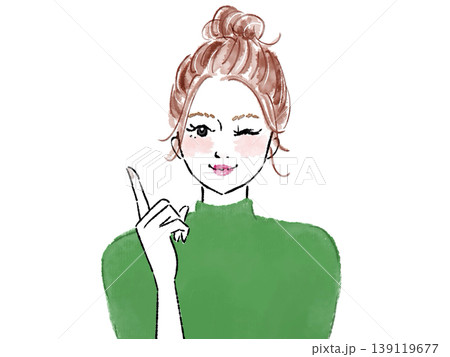 ウインクの笑顔で指をさす女性 ウインクの笑顔で指をさす女性 139119677