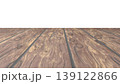 Perspective view of a flat wooden surface with a pronounced texture and annual rings. 139122866