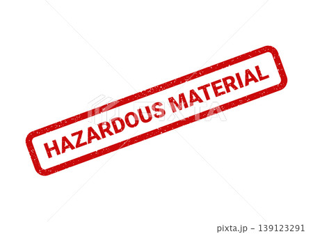 Textured red rubber stamp displaying the vital warning text hazardous material for chemical safety 139123291