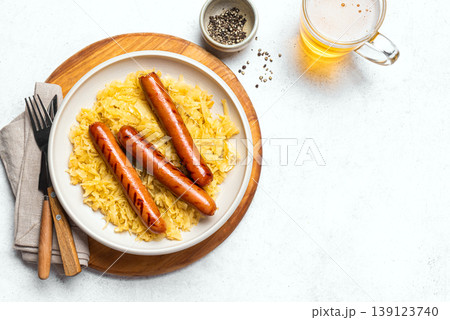 Bavarian Bratwurst meal with Sauerkraut and Beer 139123740