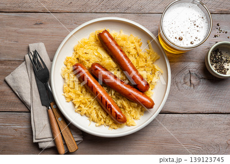 German Bratwurst meal with Sauerkraut and Beer 139123745