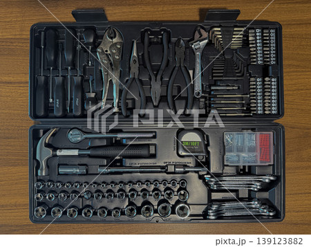 Complete Household Tool Kit in Open Toolbox with Hammer Screwdrivers Pliers Wrenches Socket Set DIY Home Repair Maintenance Construction Flat Lay Complete Household Tool Kit in Open Toolbox with Hammer Screwdrivers Pliers Wrenches Socket Set DIY Home Repair Maintenance Construction Flat Lay 139123882