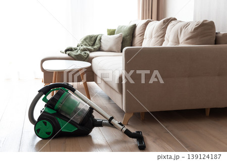 Vacuum Cleaner in Cozy Living Room Vacuum Cleaner in Cozy Living Room 139124187