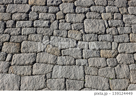 ancient stone wall pattern, stone background. ancient stone wall pattern, stone background. 139124449