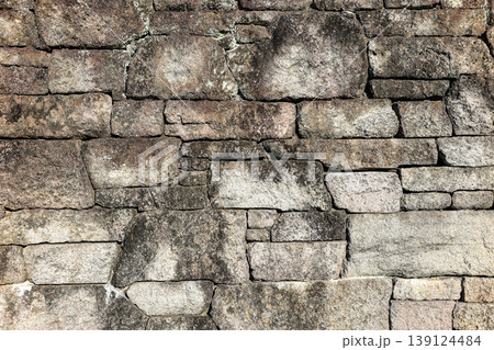 ancient stone wall pattern, stone background. ancient stone wall pattern, stone background. 139124484