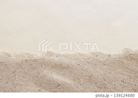 Kraft paper sheet with deckle edge, fiber texture, two tone surface with smooth and rough zones, ideal for design backdrop, mockup. Natural background, paper texture, organic fibers, copy space Kraft paper sheet with deckle edge, fiber texture, two tone surface with smooth and rough zones, ideal for design backdrop, mockup. Natural background, paper texture, organic fibers, copy space 139124880