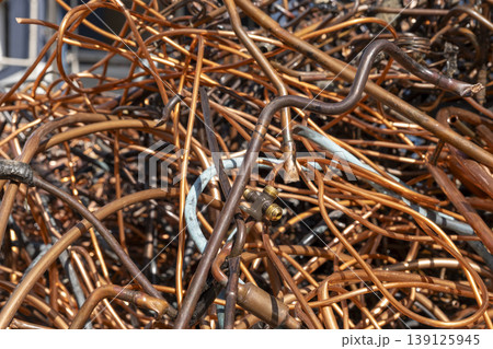 Old and corroded copper tubes from air conditioners. Old and corroded copper tubes from air conditioners. 139125945