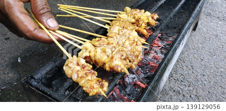 Grilled Chicken Satay Over Hot Charcoal Grilled Chicken Satay Over Hot Charcoal 139129056