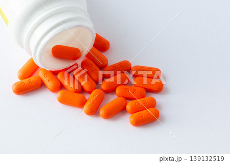 Ibuprofen Tablets Spilled from the Bottle Ibuprofen Tablets Spilled from the Bottle 139132519