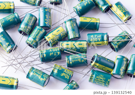 Isolated capacitor, used in electronic device. Electronic parts concept Isolated capacitor, used in electronic device. Electronic parts concept 139132540