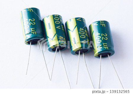 4 Isolated capacitor, used in electronic device. Electronic parts concept 4 Isolated capacitor, used in electronic device. Electronic parts concept 139132565