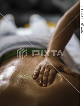 man getting massage at spa man getting massage at spa 139134159