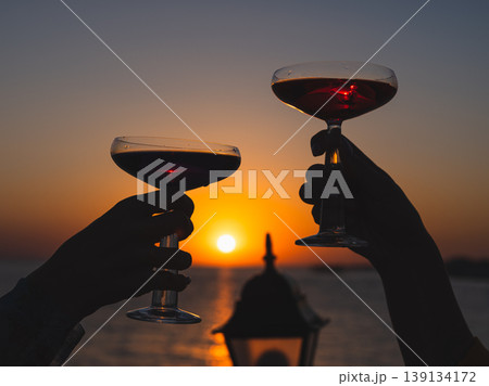a romantic honeymoon celebration at sunset a romantic honeymoon celebration at sunset 139134172