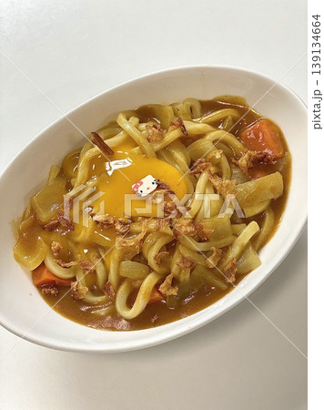 Thick, chewy udon noodles in a rich and savory Japanese curry sauce, topped with green onions and your choice of protein. A comforting dish with bold, hearty flavors. 139134664