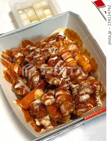 Crispy Korean fried chicken, perfectly glazed with a sweet and spicy sauce. Ideal for food photography and menus, showcasing the irresistible crunch and flavor of this beloved dish. Crispy Korean fried chicken, perfectly glazed with a sweet and spicy sauce. Ideal for food photography and menus, showcasing the irresistible crunch and flavor of this beloved dish. 139134762