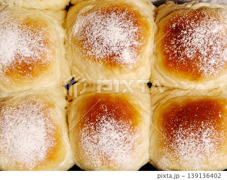 Powdered sugar pastry buns. Close up dessert background. Powdered sugar pastry buns. Close up dessert background. 139136402