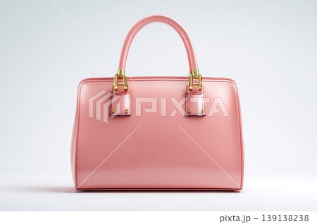 Peach pink color leather bag and metal golden hardware details isolated white background. Fashionable luxury female accessory. Simple shape design. Woman Handbag designed in classic style. Shiny clasp Peach pink color leather bag and metal golden hardware details isolated white background. Fashionable luxury female accessory. Simple shape design. Woman Handbag designed in classic style. Shiny clasp 139138238