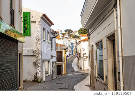 Odemira, Portugal - Feb 24, 2026: Narrow street with old white houses at village Odemira in Portugal 139139507