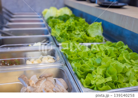 Salad bar with vegetables in the restaurant, healthy food. Salad bar with vegetables in the restaurant, healthy food. 139140258