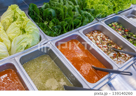 Salad bar with vegetables in the restaurant, healthy food. Salad bar with vegetables in the restaurant, healthy food. 139140260